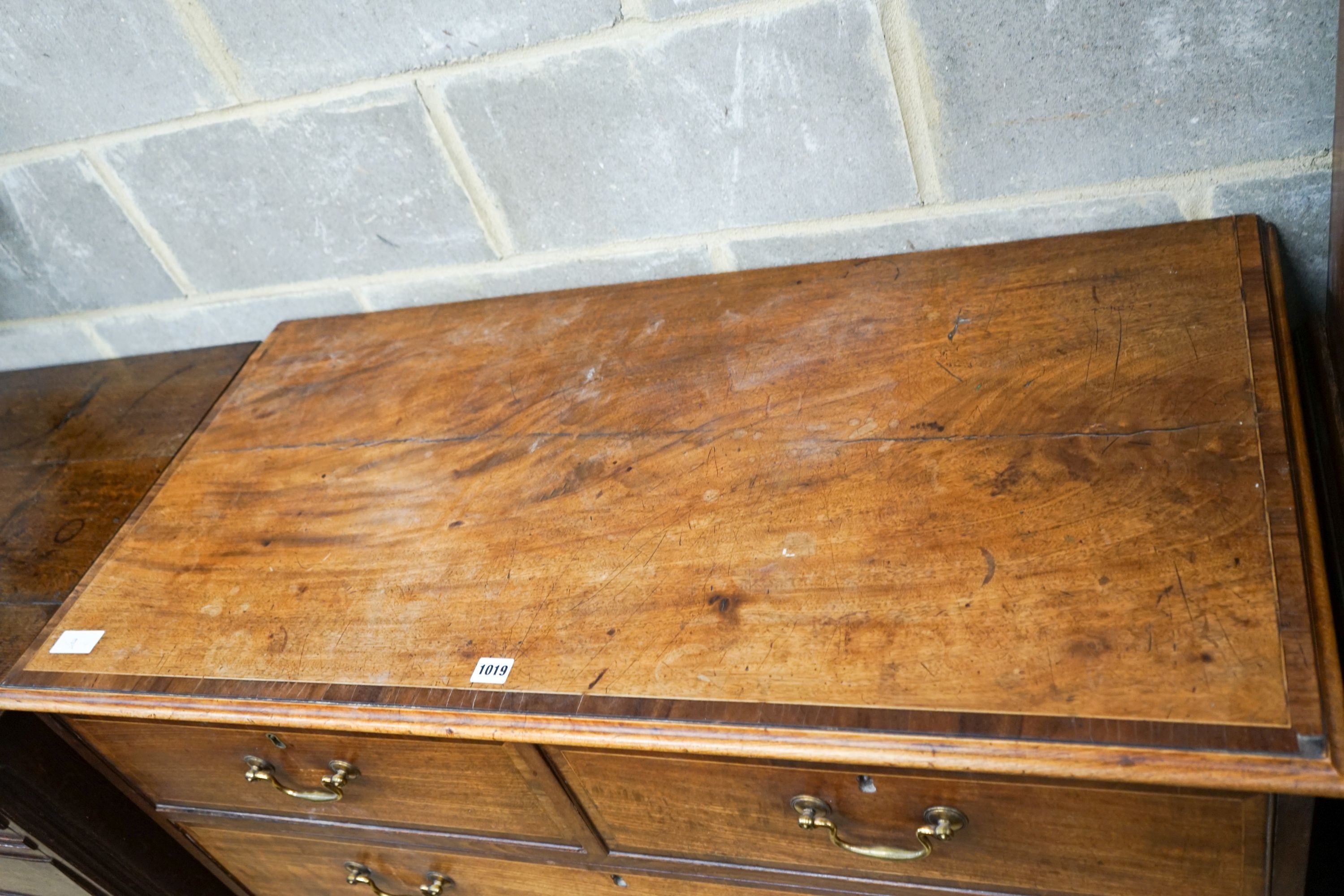 A George III banded mahogany chest, width 110cm, depth 55cm, height 110cm